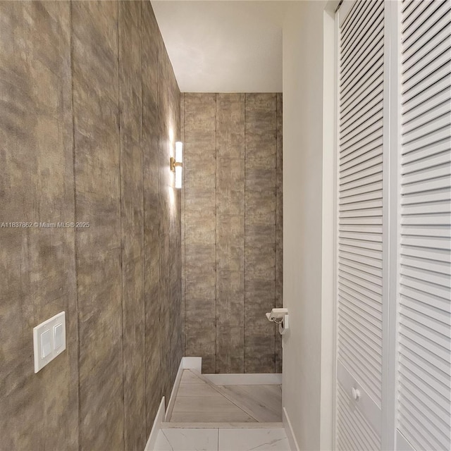 10440 NW 67th St Unit 10440, Doral, FL 33178 - bathroom featuring a closet and baseboards