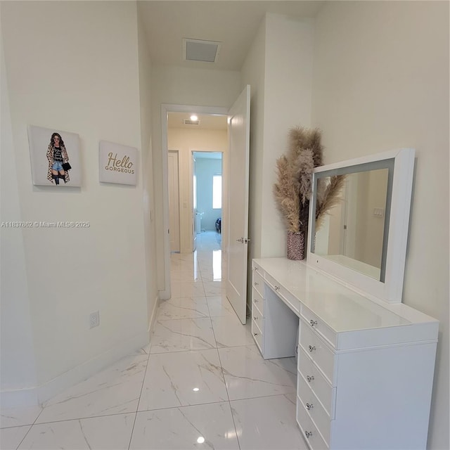 10440 NW 67th St Unit 10440, Doral, FL 33178 - corridor featuring light marble finish flooring and an office area