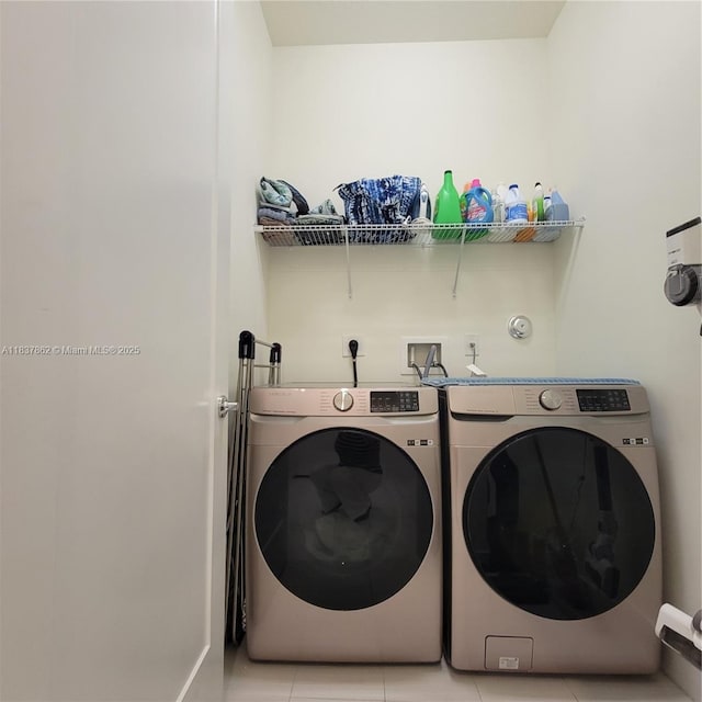 10440 NW 67th St Unit 10440, Doral, FL 33178 - laundry area featuring washing machine and clothes dryer