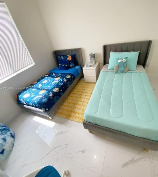 10440 NW 67th St Unit 10440, Doral, FL 33178 - bedroom with marble look tiles
