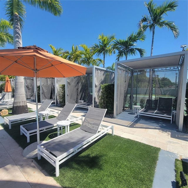10440 NW 67th St Unit 10440, Doral, FL 33178 - view of yard featuring a patio area