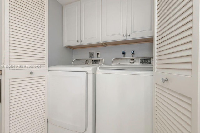 2814 N 46th Ave Unit H277, Hollywood, FL 33021 - washroom featuring separate washer and dryer and cabinet space