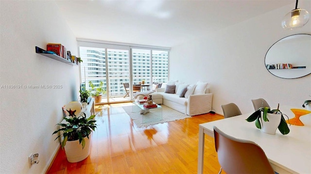 5600 Collins Ave Unit 10A, Miami Beach, FL 33140 - living area with wood finished floors