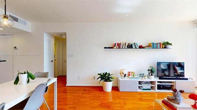 5600 Collins Ave Unit 10A, Miami Beach, FL 33140 - living area featuring wood finished floors and baseboards