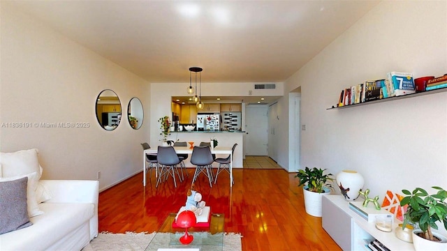 5600 Collins Ave Unit 10A, Miami Beach, FL 33140 - dining area featuring light wood-style flooring