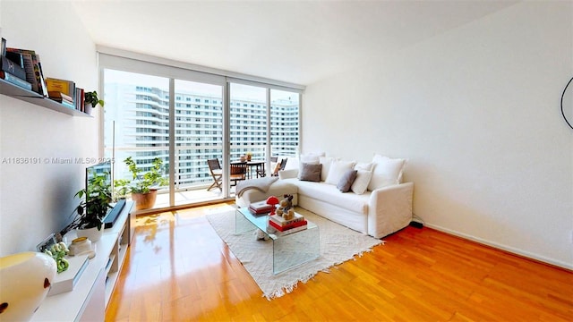 5600 Collins Ave Unit 10A, Miami Beach, FL 33140 - living area featuring light wood finished floors