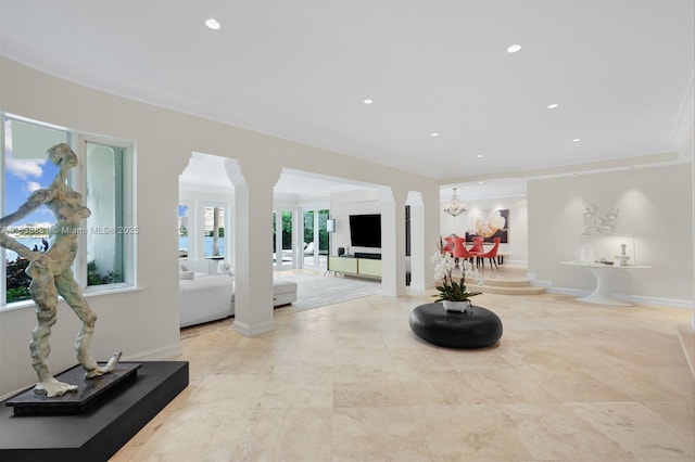 315 E Rivo Alto Dr, Miami Beach, FL 33139 - living area with a chandelier, recessed lighting, crown molding, and ornate columns