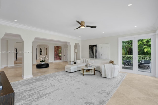 315 E Rivo Alto Dr, Miami Beach, FL 33139 - living area with light tile patterned floors, arched walkways, a ceiling fan, ornamental molding, and recessed lighting