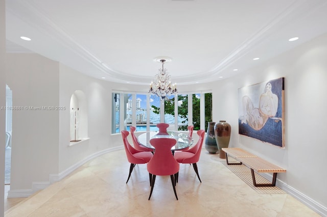 315 E Rivo Alto Dr, Miami Beach, FL 33139 - dining room with a chandelier, recessed lighting, a tray ceiling, and crown molding