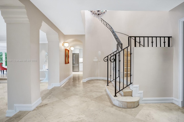 315 E Rivo Alto Dr, Miami Beach, FL 33139 - entrance foyer featuring arched walkways and stairs
