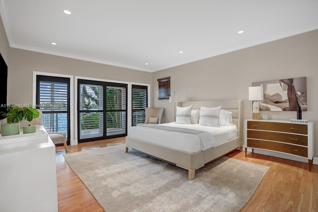 315 E Rivo Alto Dr, Miami Beach, FL 33139 - bedroom featuring light wood-style flooring, ornamental molding, access to exterior, and recessed lighting