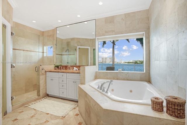 315 E Rivo Alto Dr, Miami Beach, FL 33139 - full bath with vanity, a shower stall, a jetted tub, tile walls, and crown molding