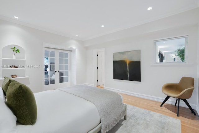 315 E Rivo Alto Dr, Miami Beach, FL 33139 - bedroom with wood finished floors, french doors, and recessed lighting