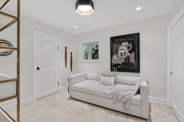 315 E Rivo Alto Dr, Miami Beach, FL 33139 - living area with recessed lighting and tile patterned floors
