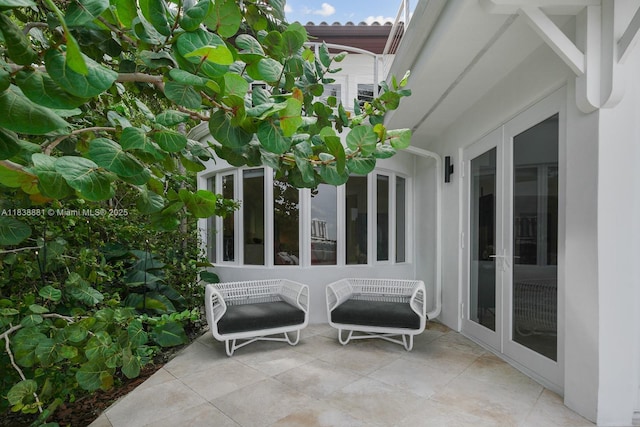 315 E Rivo Alto Dr, Miami Beach, FL 33139 - view of patio / terrace featuring french doors
