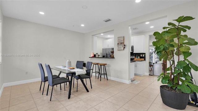 814 SW 147th Ave Unit 3606, Pembroke Pines, FL 33027 - dining space with recessed lighting and light tile patterned floors