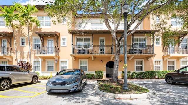 814 SW 147th Ave Unit 3606, Pembroke Pines, FL 33027 - mediterranean / spanish house featuring stucco siding and uncovered parking
