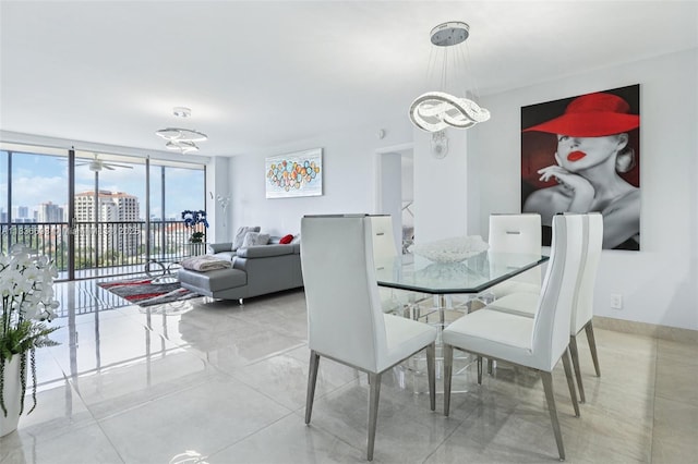 20379 W Country Club Dr Unit 1436, Aventura, FL 33180 - dining area featuring a chandelier, floor to ceiling windows, and tile patterned flooring