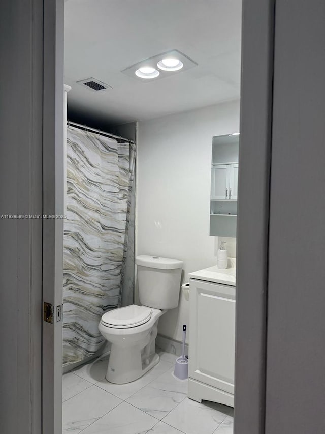 17000 NW 67th Ave Unit 206, Hialeah, FL 33015 - bathroom featuring marble look tiles and vanity