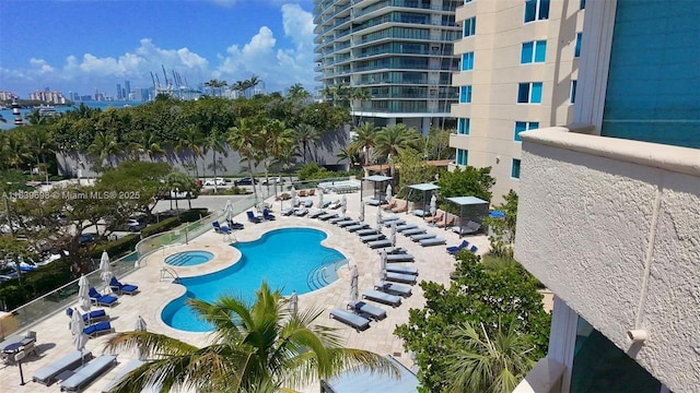300 S Pointe Dr Unit 501, Miami Beach, FL 33139 - community pool featuring a patio and a hot tub