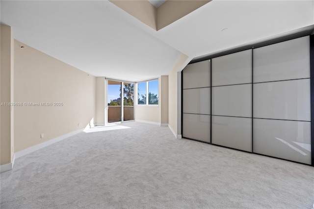 300 S Pointe Dr Unit 501, Miami Beach, FL 33139 - unfurnished bedroom with carpet floors and baseboards