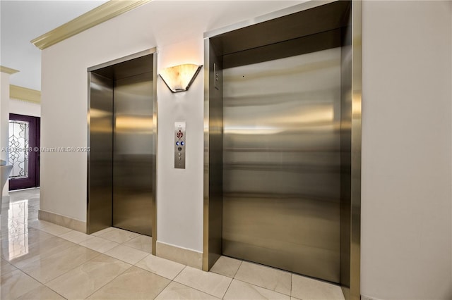 300 S Pointe Dr Unit 501, Miami Beach, FL 33139 - elevator with baseboards and crown molding
