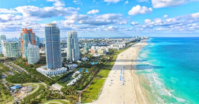 300 S Pointe Dr Unit 501, Miami Beach, FL 33139 - bird's eye view of waterfront with a beach and skyline