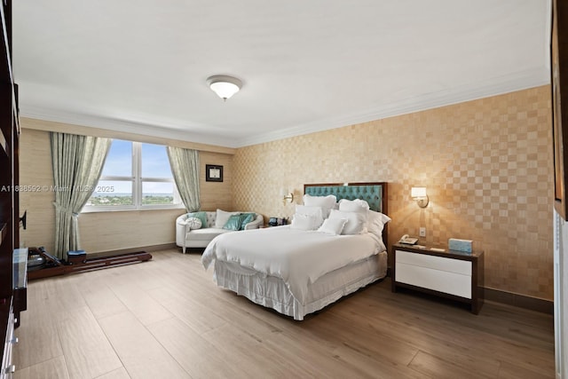 445 Grand Bay Dr Unit 1011, Key Biscayne, FL 33149 - bedroom with wallpapered walls, wood finished floors, and crown molding