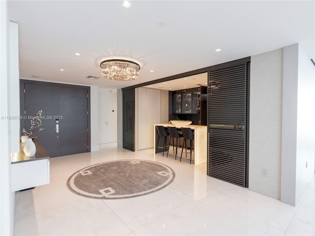 17475 Collins Ave Unit 1001, Sunny Isles Beach, FL 33160 - reception area with a chandelier