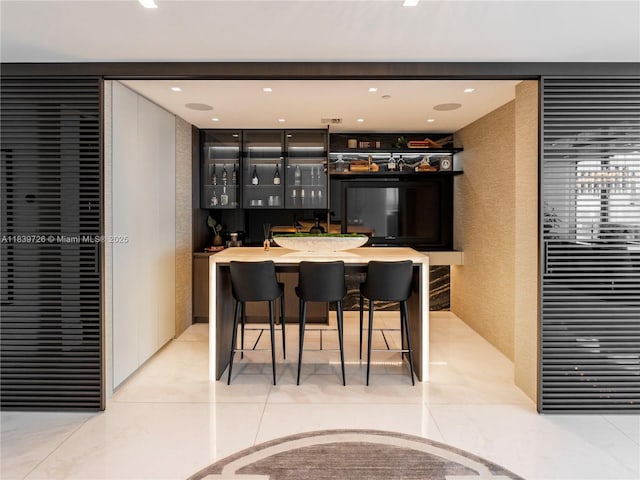 17475 Collins Ave Unit 1001, Sunny Isles Beach, FL 33160 - indoor wet bar with a textured wall and recessed lighting