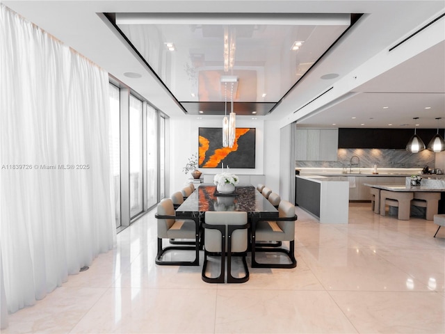 17475 Collins Ave Unit 1001, Sunny Isles Beach, FL 33160 - dining area with light marble finish floors