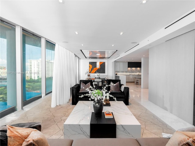 17475 Collins Ave Unit 1001, Sunny Isles Beach, FL 33160 - living room with expansive windows and recessed lighting