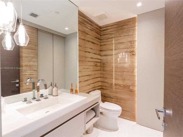 17475 Collins Ave Unit 1001, Sunny Isles Beach, FL 33160 - bathroom featuring vanity and toilet