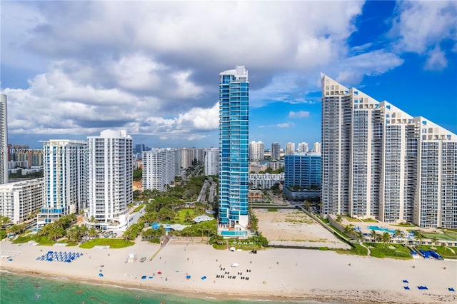 17475 Collins Ave Unit 1001, Sunny Isles Beach, FL 33160 - view of building exterior with view of water and beach and a view of skyline
