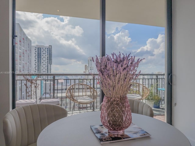 999 SW 1st Ave Unit 1609, Miami, FL 33130 - balcony featuring a city view and outdoor dining area