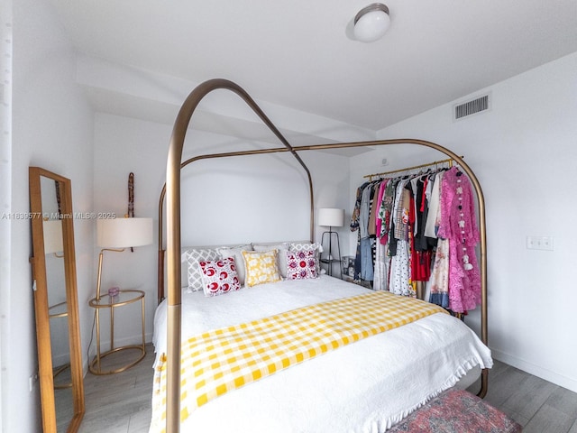999 SW 1st Ave Unit 1609, Miami, FL 33130 - bedroom with wood finished floors and baseboards