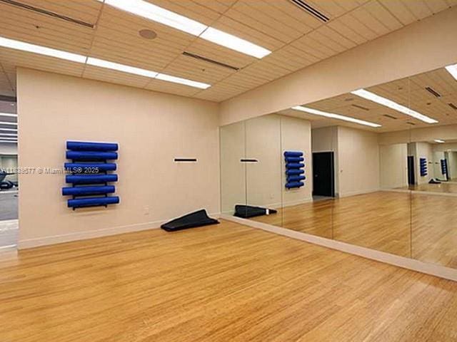 999 SW 1st Ave Unit 1609, Miami, FL 33130 - exercise area featuring wood finished floors and baseboards