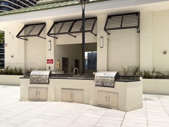 999 SW 1st Ave Unit 1609, Miami, FL 33130 - view of patio / terrace with exterior kitchen