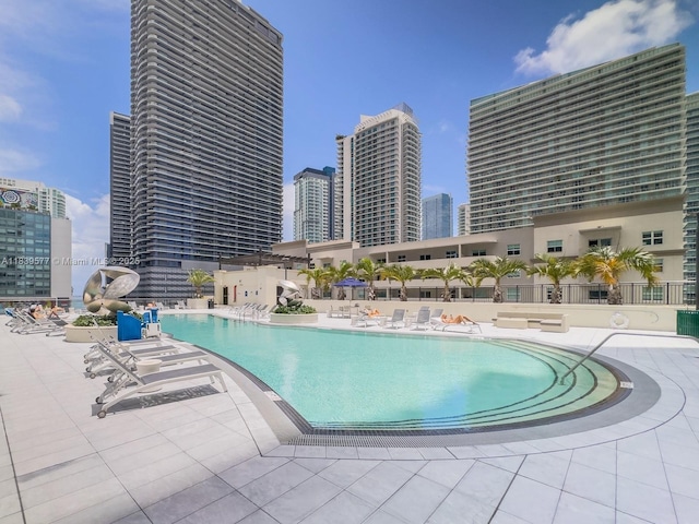 999 SW 1st Ave Unit 1609, Miami, FL 33130 - community pool with a skyline view and a patio