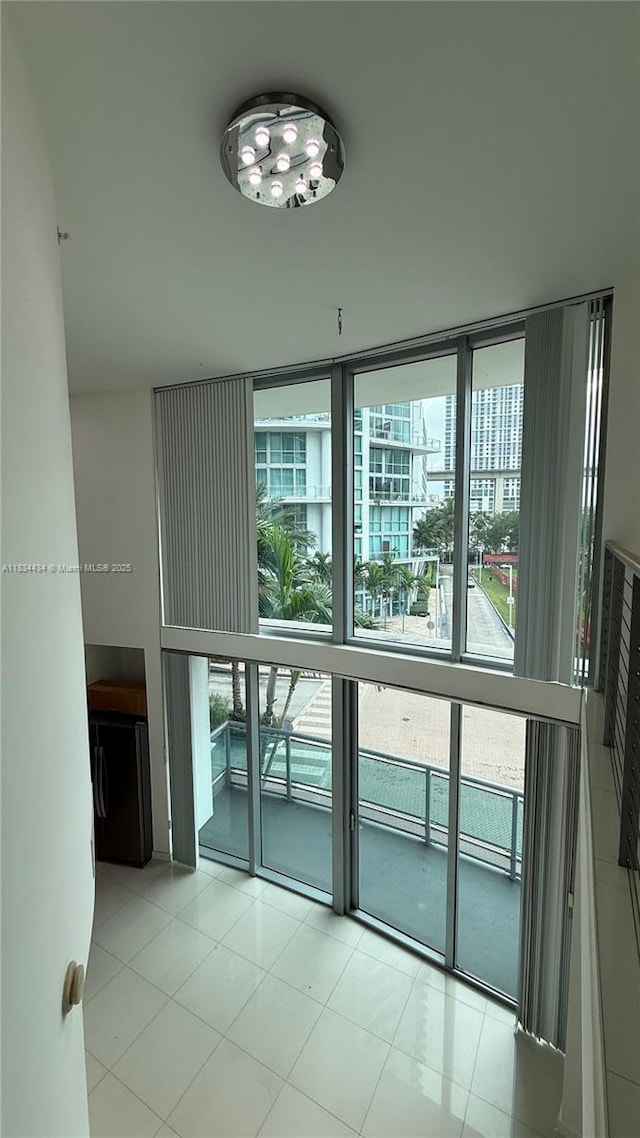 350 S Miami Ave Unit 312, Miami, FL 33130 - tiled empty room featuring a wall of windows