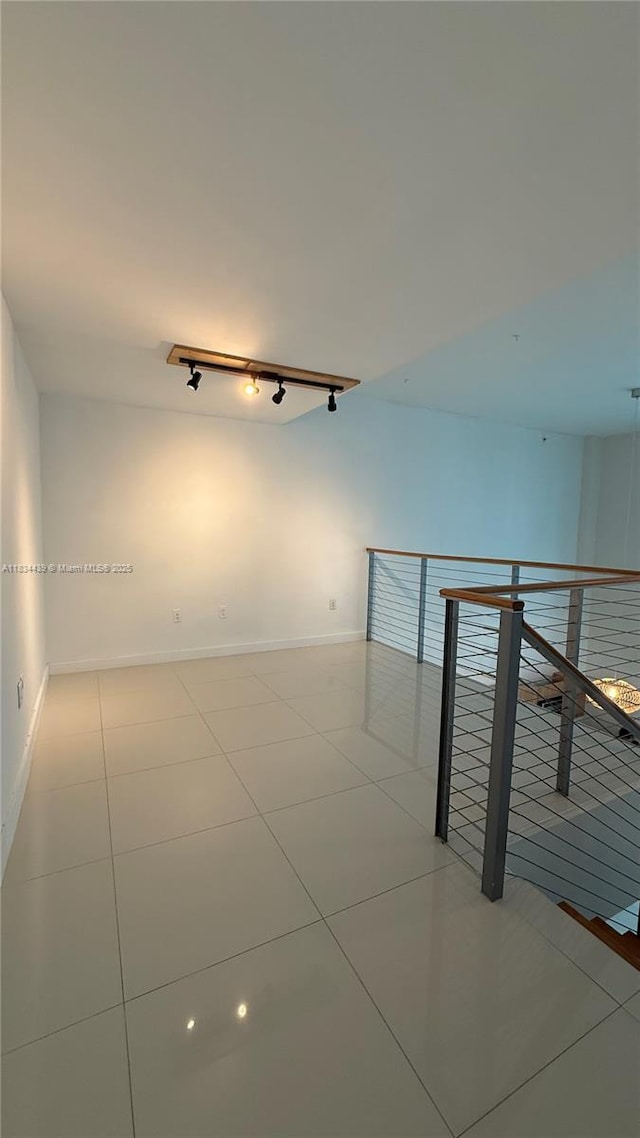 350 S Miami Ave Unit 302, Miami, FL 33130 - spare room featuring light tile patterned floors and track lighting
