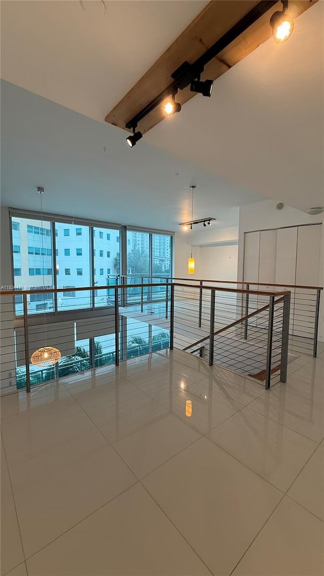 350 S Miami Ave Unit 302, Miami, FL 33130 - tiled empty room with rail lighting