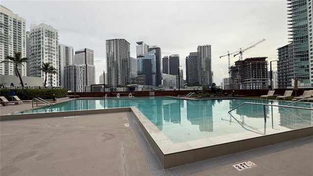 350 S Miami Ave Unit 302, Miami, FL 33130 - community pool featuring a skyline view