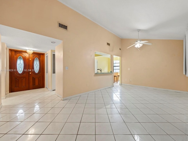 1440 Egret Rd, Homestead, FL 33035 - foyer entrance featuring light tile patterned floors, crown molding, and a ceiling fan