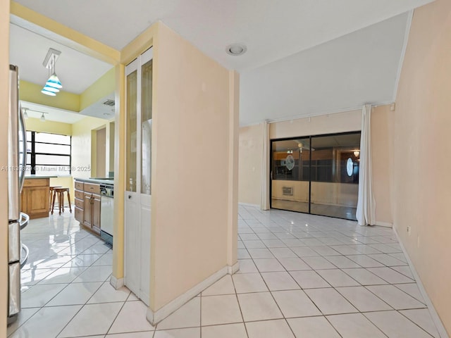 1440 Egret Rd, Homestead, FL 33035 - hallway featuring light tile patterned floors and baseboards