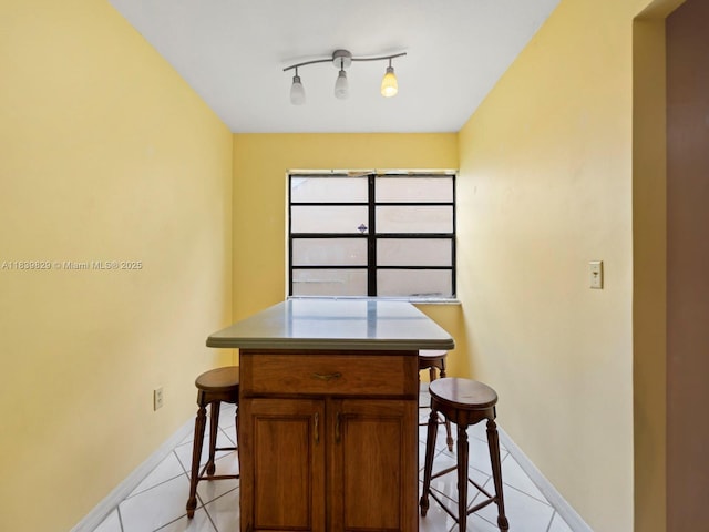 1440 Egret Rd, Homestead, FL 33035 - dining area featuring light tile patterned floors and baseboards