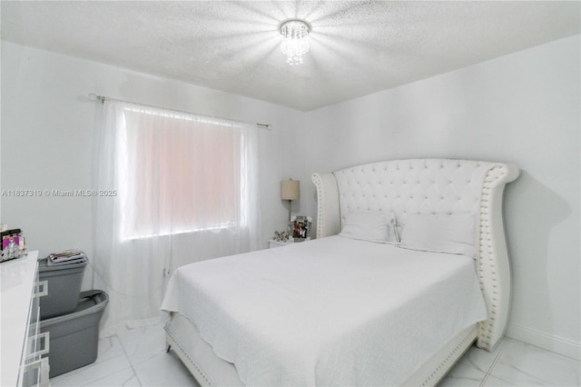 231 E 41st St, Hialeah, FL 33013 - bedroom featuring light marble finish flooring