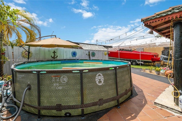 231 E 41st St, Hialeah, FL 33013 - view of pool featuring a fenced backyard and a patio