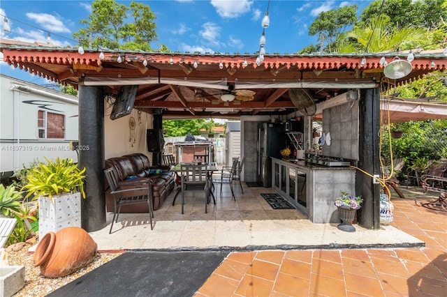 231 E 41st St, Hialeah, FL 33013 - view of patio featuring a gazebo, ceiling fan, an outdoor kitchen, and outdoor lounge area
