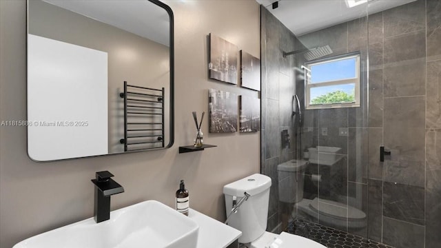 18701 Shauna Manor Dr, Boca Raton, FL 33496 - bathroom featuring a shower stall, a towel warmer, and vanity